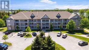 324 - 60 MULLIGAN LANE | Wasaga Beach Ontario | Slide Image One