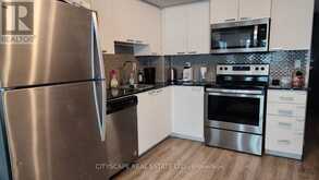606 - 2152 LAWRENCE AVENUE E | Toronto Ontario | Slide Image Three