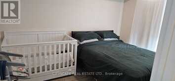 606 - 2152 LAWRENCE AVENUE E | Toronto Ontario | Slide Image Four