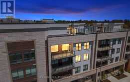 414 - 123 MAURICE DRIVE | Oakville Ontario | Slide Image Three
