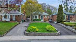 64 NESBITT DRIVE | Toronto Ontario | Slide Image One