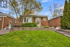 64 NESBITT DRIVE | Toronto Ontario | Slide Image Two