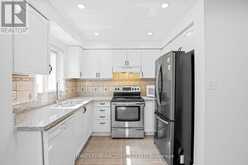 42 - 435 MIDDLEFIELD ROAD | Toronto Ontario | Slide Image Three