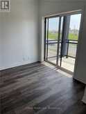 320 - 102 GROVEWOOD COMMON DRIVE | Oakville Ontario | Slide Image Two