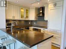 612 - 15 STOLLERY POND CRESCENT | Markham Ontario | Slide Image Ten