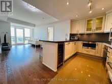 612 - 15 STOLLERY POND CRESCENT | Markham Ontario | Slide Image Five