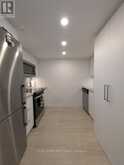 418 - 30 TRETTI WAY | Toronto Ontario | Slide Image Two