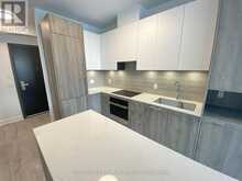 211 - 38 WATER WALK DRIVE | Markham Ontario | Slide Image Two