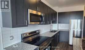 404 - 3285 CARDING MILL TRAIL | Oakville Ontario | Slide Image Five