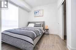 206 - 6065 MCLEOD ROAD | Niagara Falls Ontario | Slide Image Three
