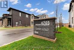 102 - 6705 CROPP STREET E | Niagara Falls Ontario | Slide Image Two