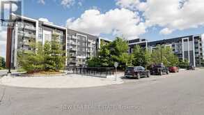229 - 128 GROVEWOOD COMMON | Oakville Ontario | Slide Image One
