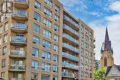 207 - 140 BATHURST STREET | Toronto Ontario | Slide Image One