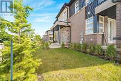 28 - 5672 DORCHESTER ROAD | Niagara Falls Ontario | Slide Image Two