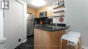 112 - 20 MACHELLS AVENUE N | Toronto Ontario | Slide Image Nine