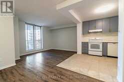 306 - 3559 EGLINTON AVENUE W | Toronto Ontario | Slide Image Three