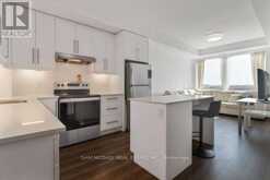 318 - 3200 WILLIAM COLTSON AVENUE | Oakville Ontario | Slide Image Thirteen