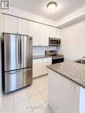 124 - 80 ASPEN SPRINGS DRIVE | Clarington Ontario | Slide Image Three