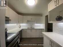205 - 895 KENNEDY ROAD | Toronto Ontario | Slide Image One