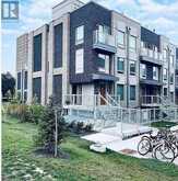 213 - 7 APPLEWOOD LANE | Toronto Ontario | Slide Image One