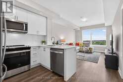 622 - 3200 WILLIAM COLTSON AVENUE | Oakville Ontario | Slide Image Two