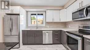 36 - 250 BRIDLETOWNE CIRCLE | Toronto Ontario | Slide Image Three