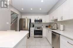 6 - 5150 DORCHESTER ROAD | Niagara Falls Ontario | Slide Image Eleven