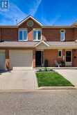 6 - 5150 DORCHESTER ROAD | Niagara Falls Ontario | Slide Image Two