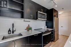 517 - 2300 ST. CLAIR AVENUE W | Toronto Ontario | Slide Image Three