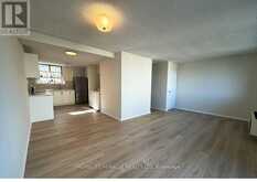 303 - 665 KENNEDY ROAD | Toronto Ontario | Slide Image One