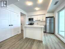 102 - 15 KNEESHAW DRIVE | Barrie Ontario | Slide Image Two