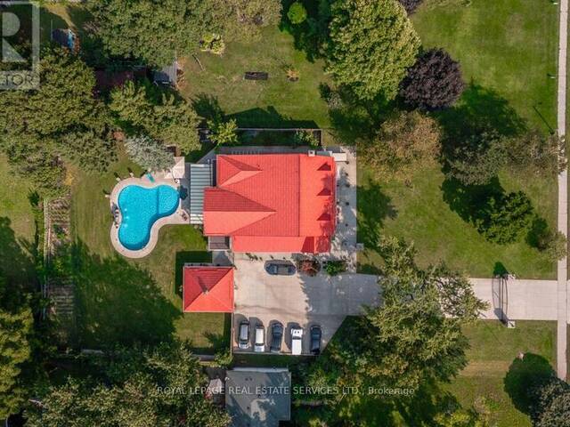 6949 THOROLD STONE ROAD Niagara Falls Ontario, L2J 1B5 - 8 Bedrooms Home For Sale