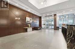 925 - 36 BLUE JAYS WAY | Toronto Ontario | Slide Image Two