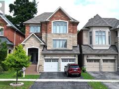 61 MAGDALAN CRESCENT Richmond Hill Ontario, L4E 0W4