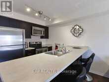 7 - 129 ISAAC DEVINS BOULEVARD | Toronto Ontario | Slide Image Nine