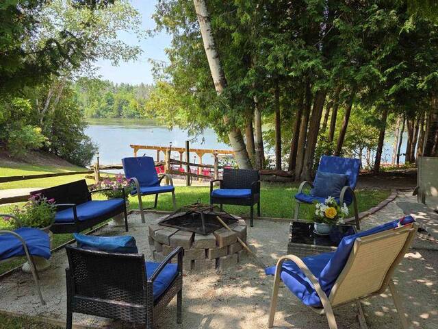 SITE# 409 - 2894 HOGBACK ROAD New Lowell Ontario, L0M 1N0 - 2 Bedrooms Waterfront Home For sale