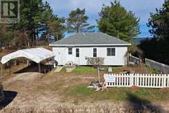 4 PINEWOOD DRIVE | Tiny Ontario | Slide Image One