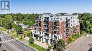 206 - 34 PLAINS ROAD E | Burlington Ontario | Slide Image Two