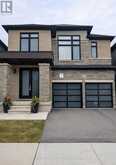 24 WALTER CLIFFORD NESBITT DRIVE | Whitby Ontario | Slide Image One