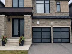 24 WALTER CLIFFORD NESBITT DRIVE Whitby Ontario, L1P 0G5
