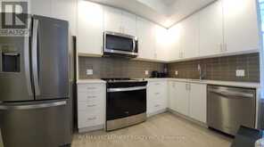 607 - 3220 WILLIAM COLTSON AVENUE | Oakville Ontario | Slide Image Three