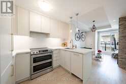 405 - 73 WASHINGTON AVENUE | Oakville Ontario | Slide Image Two