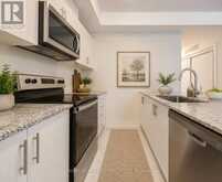 8 - 145 TAPSCOTT ROAD | Toronto Ontario | Slide Image Three