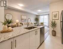 8 - 145 TAPSCOTT ROAD | Toronto Ontario | Slide Image Four