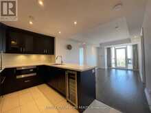 711 - 15 STOLLERY POND CRESCENT | Markham Ontario | Slide Image Three