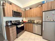 18 - 155 TAPSCOTT ROAD | Toronto Ontario | Slide Image Eight