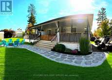 WCL-CT015 - 15 CHIPPEWA TRAIL | Wasaga Beach Ontario | Slide Image Three