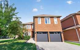 63 ERIC CLARKE DRIVE | Whitby Ontario | Slide Image Two