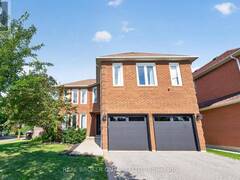 63 ERIC CLARKE DRIVE Whitby Ontario, L1R 2H6