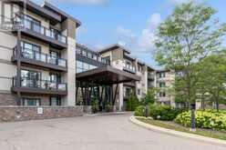203 - 128 GARDEN DRIVE | Oakville Ontario | Slide Image One